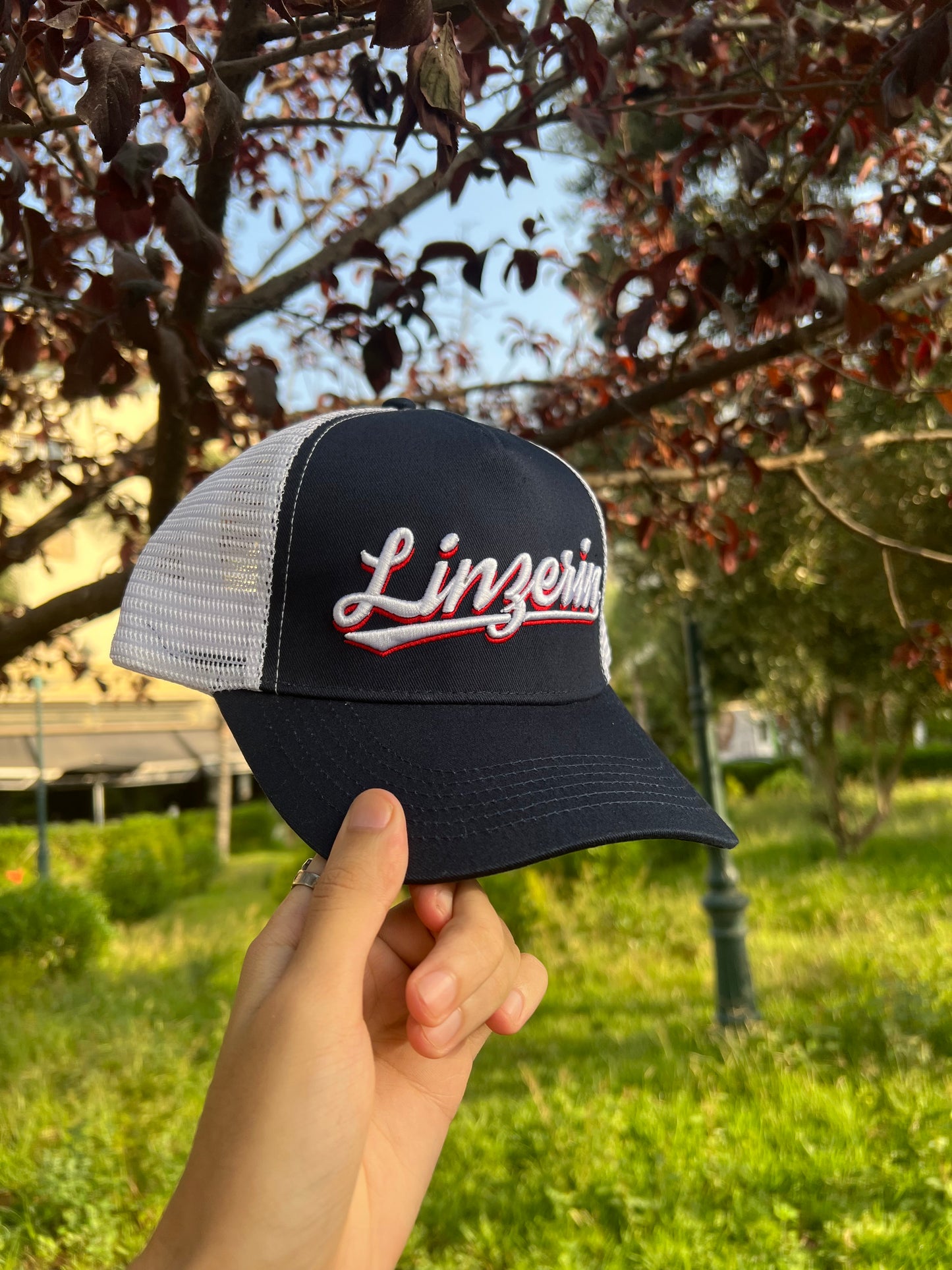 Navy Blue “Linzerin” Trucker Cap